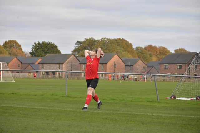 Harry Scrowston in action for Pocklington Town 1sts. Photo by Andy Nelson