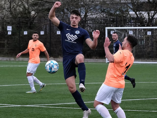 Edgehill stalwart Joel Ramm tries to close down a Haxby player