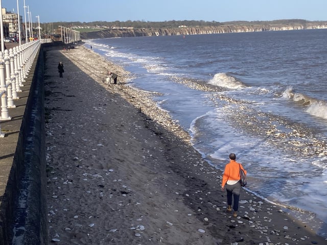 Even though the tide was high, visitors still took advantage of the weather to take a stroll on North Beach.