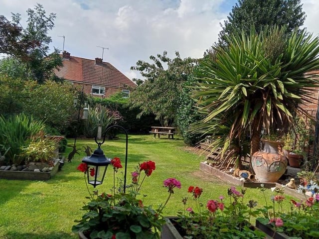A well-designed, enclosed and established garden with lawn and decked patio area is one attraction of this property to the north side of Bridlington.