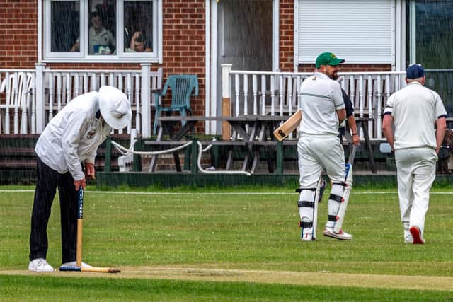 The Whitby and Shildon players head off after only one over due to rain at The Turnbull Ground. Photo by Brian Murfield