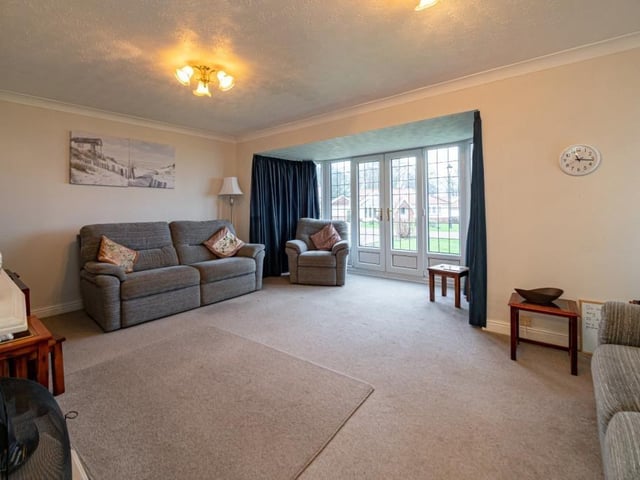 Ample space to fill as desired in the sitting room.