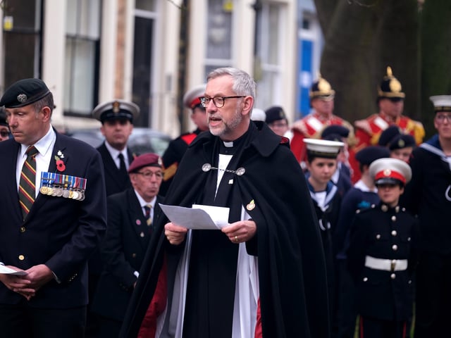 Reverend Richard Walker leads the service