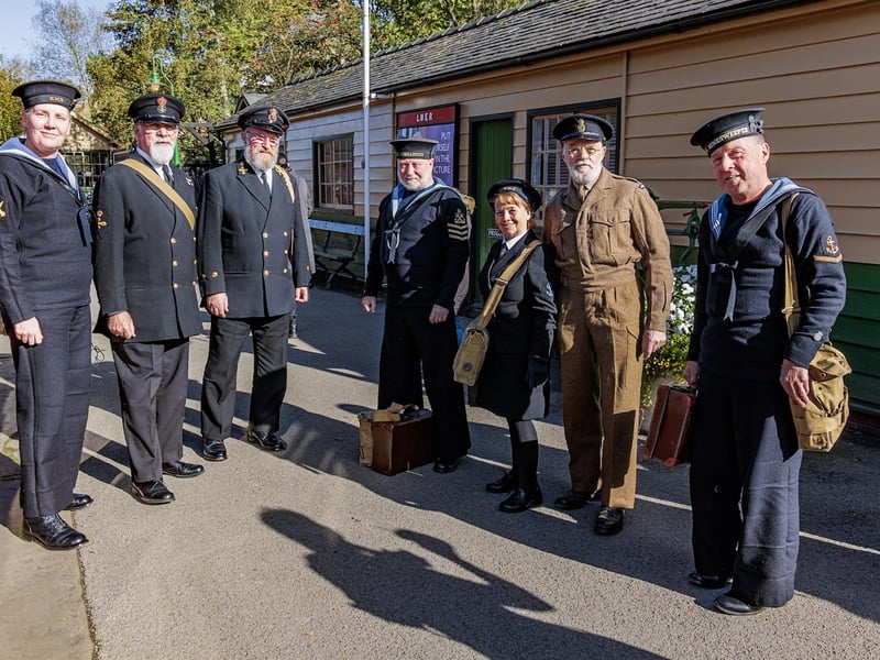 Costumed characters waiting on the platform.
picture: Tim Bruce