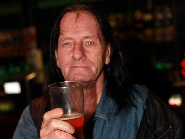 Kane enjoying a cheeky pint in Quids Inn.