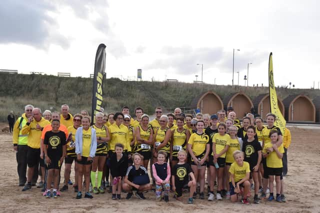 All the senior and junior Bridlington Road Runners line up before the Eddie Knapp Challenge beach race