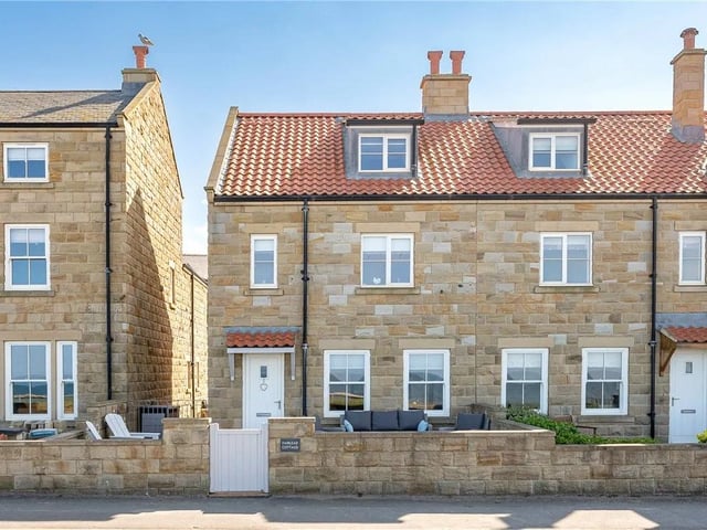 This four bedroom, two bathroom end terrace house is currently for sale with Carter Jonas for £900,000