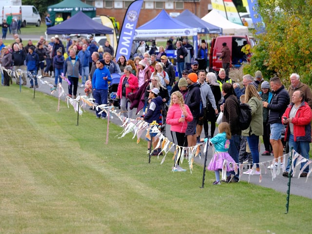 Spectators enjoy the festival displays.