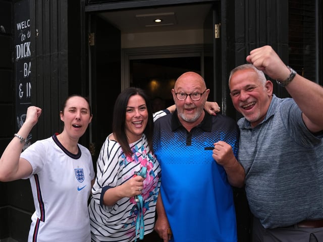 Cheering outside The Dickens Bar