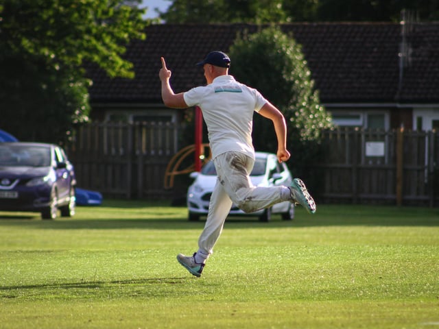 A Sherburn player celebrates a wicket.