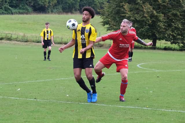 Scalby, yellow and black kit, were edged out by South Cave. Photo by Richard Ponter