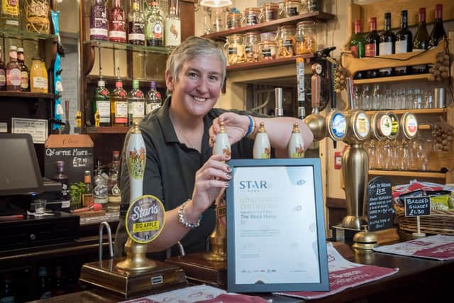 Sue Paling behind the bar at the Black Horse.
