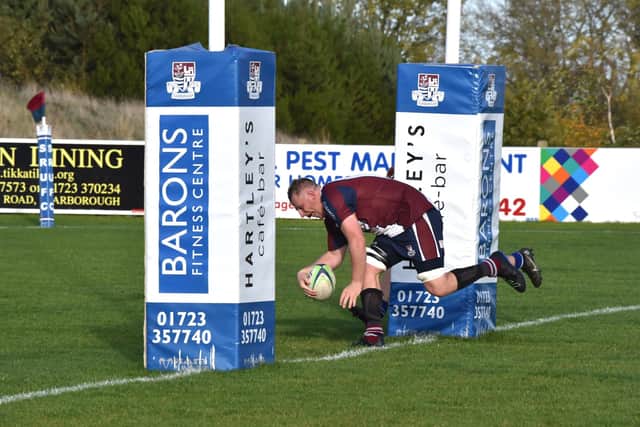 Aaron Wilson scores a try for Scarborough RUFC