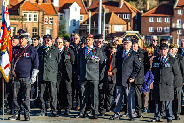 People paying their respects on Remembrance Sunday in Whitby.