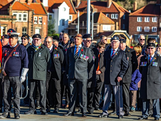 People paying their respects on Remembrance Sunday in Whitby.