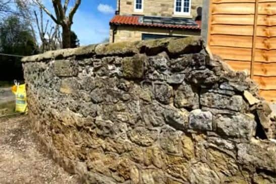 Curve in the stone wall at Farm Close, Gristhorpe.