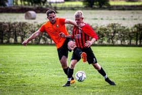 West Pier, striped shirt, in action against Edgehill earlier this season.