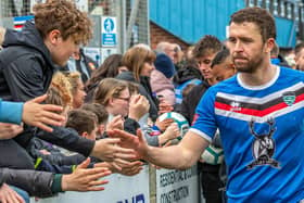 Dan Rowe thanks the Blues fans after their 2-0 home win against Macclesfield in the final game of the league season. PHOTO BY BRIAN MURFIELD