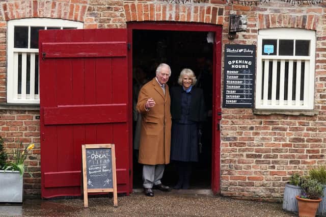 King Charles III and the Queen Consort during their visit to Talbot Yard Food Court in Yorkersgate, Malton, North Yorkshire, where they met food and drink producers with shops and heard more about their locally produced goods.