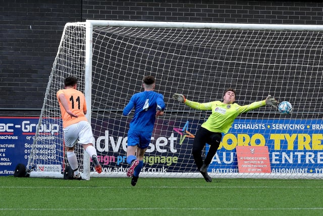 Joel Ramm opens the scoring for Edgehill in the cup final.