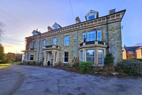 The front aspect of bay-fronted 1 Throxenby Hall.