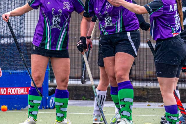 Danby's Katie Hodgson is struck on the head by the ball.