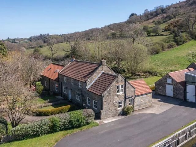 This seven bedroom, three bathroom and six reception room detached house is currently for sale with Cundalls for offers over £1,350,000.