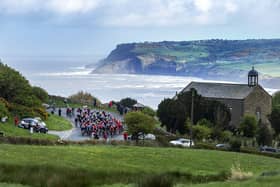 Tour de Yorkshire peloton at Robin Hoods Bay - the Tour of Britain passes through the seaside village today.