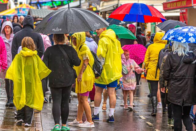 The heavens opened on Monday, but it failed to deter the regatta crowds.
picture: Brian Murfield.