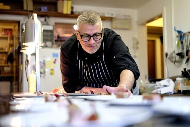 Orchard Lodge restaurant chef Micharl Burgoyne working on his dishes