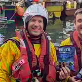 Scarborough lifeboat crew with the limited edition crisp packs - Image: RNLI