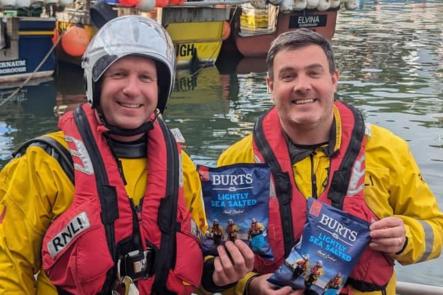 Scarborough lifeboat crew with the limited edition crisp packs - Image: RNLI