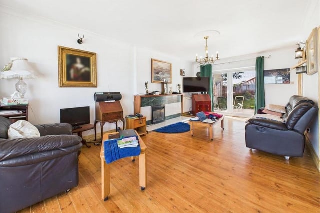 The bay fronted lounge has French doors out to the rear garden.