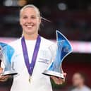 Beth Mead of England is awarded with the Top Goalscorer and Player of the Tournament awards at Euro 22. (Photo by Naomi Baker/Getty Images)