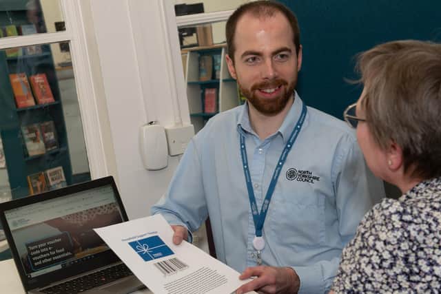 Officers and volunteers at North Yorkshire libraries helped almost 3,500 people during the fourth phase of the scheme to access their e-vouchers and are ready to help once again. Pictured is Sam Bowell, a library assistant at Scarborough library.
