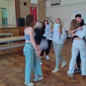 Students at Filey School embrace as they pick up their GCSE exam results.