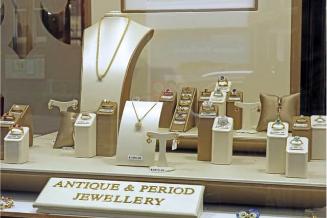The antique jewellery window at Bright & Sons