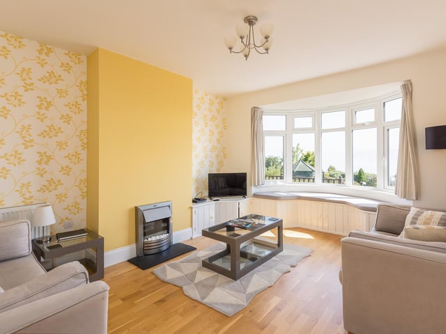 An attractive front room with feature bay window.