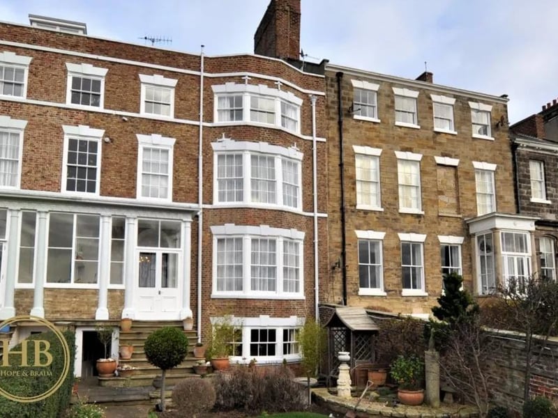 Seven bedroom town house. This is a fine example of a Grade II listed Georgian town house with the benefit of having south facing gardens and a detached double garage with artist's studio, all within walking distance of the beach. Currently listed for sale with Hope and Braim Estate Agents at a guide price of £895,000.
