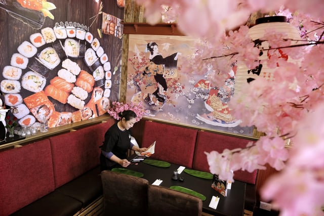 The restaurant has beautiful decor and a gorgeous cherry blossom tree in the centre.