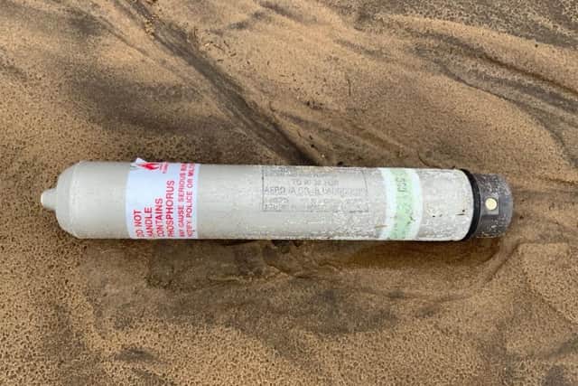 Containers and a suspected phosphorus flare had washed up on Fraisthorpe Beach. Photo: Bridlington Coastguard.
