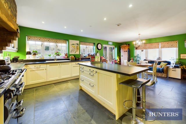 The bright and expansive kitchen with central island.