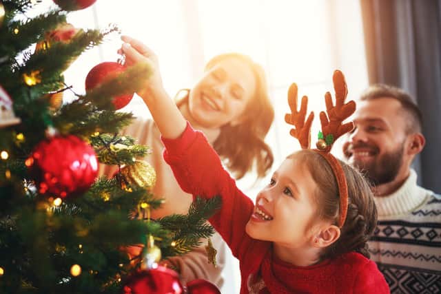 Putting up decorations can put you in the festive spirit