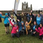 |Staff from Tees, Esk and Wear Valleys NHS Foundation Trust celebrating at the end of the 26-mile hike, at Whitby Abbey.