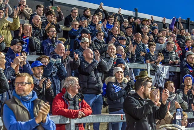Whitby fans cheer on their team at Rovers.