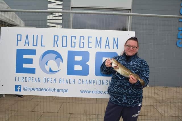 Lucy Smith pictured proudly holding her winning 1.8lb winter cod.