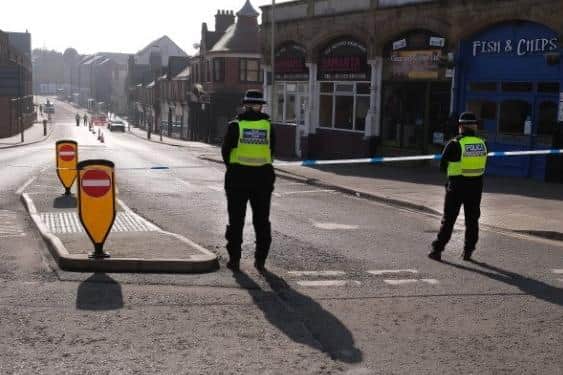 Police at the scene in Scarborough after the death of a man in Silver Street in March 2025.