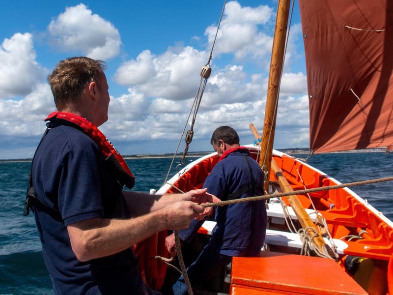 Skipper Chris Traves and Stewart McKie under control of the sail of Imperialist.