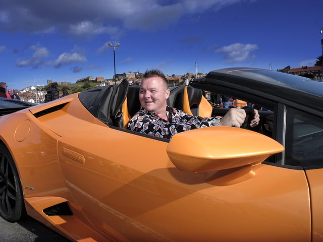 An owner taking part in the supercar parade