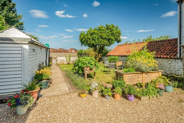 The enclosed lawned garden.